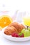 Weekend breakfast: croissants, fruit and orange