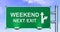 Weekend next exit road sign.