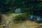 Weekend relaxation camp site tent two chairs without people here in forest edge nature outside environment life style concept