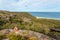 Weekend time, relaxing on a rocky ledge near the ocean