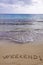 Weekend ! written in sand, on a beautiful beach