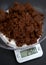 Weighing muscovado sugar