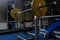 Weight bench with barbell in gym