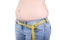 Weight loss concept - overweight woman with measure tape isolate