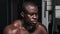 Weight training African bodybuilder portrait