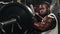 Weight training African doing bodybuilding