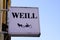 Weill text sign and logo front of clothing shop entrance of women luxury store