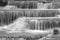 Weir on the canal black and white