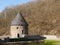 Weir Tower of a medieval valley Castle, well restored.  Built of quarry stone, the roof covered with slate tiles