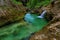 Weissbachschlucht a gorge with a blue mountain stream and many waterfalls forest a hiking trail plants and rocks