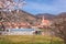 Weissenkirchen village with tourist ship on Danube river during spring time in Wachau, Austria