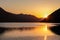 Weissensee - Breathtaking allure of sunset at alpine lake Weissensee in remote Austrian Alps in Carinthia