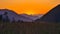 Weissensee - Silhouette of majestic mountain peaks against backdrop of vibrant sunset