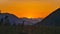 Weissensee - Silhouette of majestic mountain peaks against backdrop of vibrant sunset