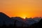 Weissensee - Silhouette of majestic mountain peaks against backdrop of vibrant sunset