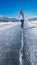 Weissensee - A woman skating on a frozen lake in Alps