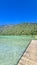 Weissensee - Wooden platform at east bank of alpine lake Weissensee in Carinthia, Austria