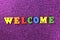 Welcom word made up of bright colored letters