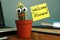 Welcome aboard concept. Funny cactus on workplace in the office