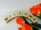 Welcome alphabet letters with tulip flower bouquet