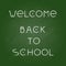 Welcome Back to school, chalk letters on green chalkboard