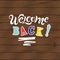 Welcome back on wooden texure background