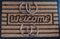 Welcome door mat with horseshoes