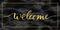 Welcome gold text on marble