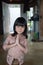 Welcome greeting from asian cute little girl