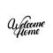 Welcome home hand written lettering.