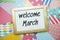 Welcome March text on colorful background