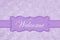 Welcome message on a pale purple rose plush fabric with ribbon