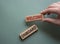 Welcome onboard symbol. Concept words Welcome onboard on wooden blocks. Beautiful grey green background. Businessman hand.