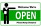 Welcome we`re open and please keep distance vector text with a man sign