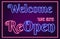 Welcome We Are ReOpen neon sign with blue and pink luminous text in a rectangular frame