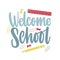 Welcome School inscription handwritten with elegant script and decorated by paper clips, push pins and ruler scattered