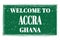 WELCOME TO ACCRA - GHANA, words written on green stamp