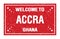WELCOME TO ACCRA - GHANA, words written on red rectangle stamp
