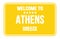 WELCOME TO ATHENS - GREECE, words written on yellow street sign stamp