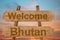 Welcome to Bhutan sing on wood background