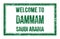 WELCOME TO DAMMAM - SAUDI ARABIA, words written on green rectangle stamp