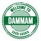 WELCOME TO DAMMAM - SAUDI ARABIA, words written on green stamp