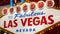 Welcome to fabulous Las Vegas retro neon sign in gambling tourist resort, USA. Iconic vintage glowing banner, symbol of casino,