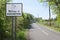 Welcome to Houston sign greeting rural village town entrance road post countryside Renfrewshire Scotland