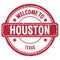 WELCOME TO HOUSTON - TEXAS, words written on red stamp