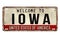 Welcome to Iowa vintage rusty metal plate