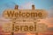 Welcome to Israel sing on wood background