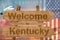 Welcome to Kentucky state in USA sign on wood, travell theme