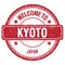 WELCOME TO KYOTO - JAPAN, words written on red stamp