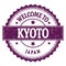 WELCOME TO KYOTO - JAPAN, words written on violet stamp